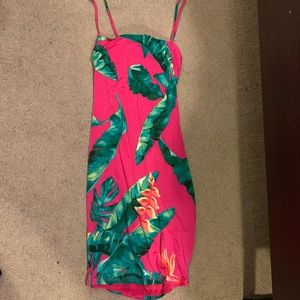 Bright pink fitted dress w/ green palm tree leaves